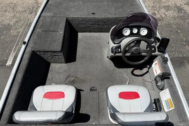 Slide: The Image of 2014 Tracker Pro 170 boat interior with dual seats and steering console. - 3