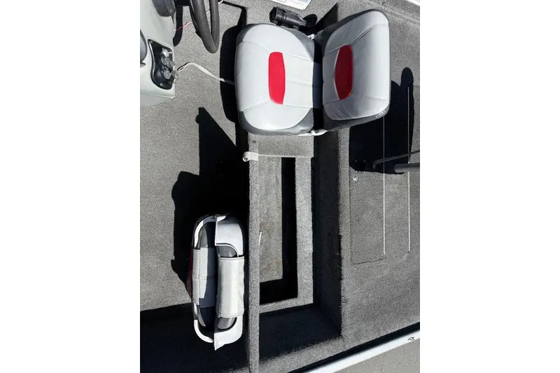 Slide: The Image of 2014 Tracker Pro 170 boat interior with seating and storage compartments. - 6