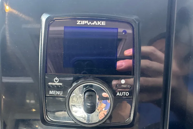 Slide: The Image of Control panel of a 2023 Beneteau Antares 11 Coupe with Zipwake system. - 18