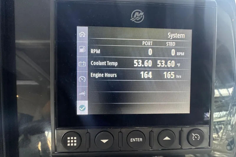 Slide: The Image of Display screen of 2023 Beneteau Antares 11 Coupe showing engine stats and coolant temperature. - 22