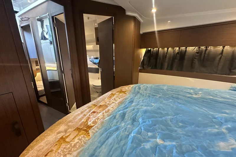 Slide: The Image of Interior of 2023 Beneteau Antares 11 Coupe, featuring cozy bedroom and modern design. - 29