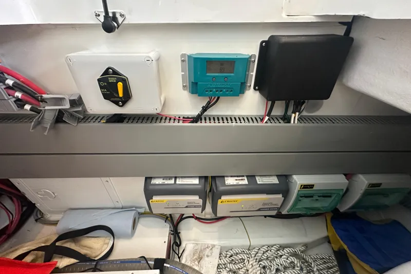 Slide: The Image of Electrical panel and components inside a 2023 Beneteau Antares 11 Coupe boat. - 37