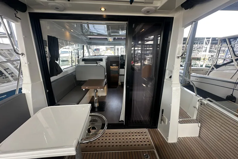 Slide: The Image of Interior view of 2023 Beneteau Antares 11 Coupe, featuring modern seating and sleek design. - 41