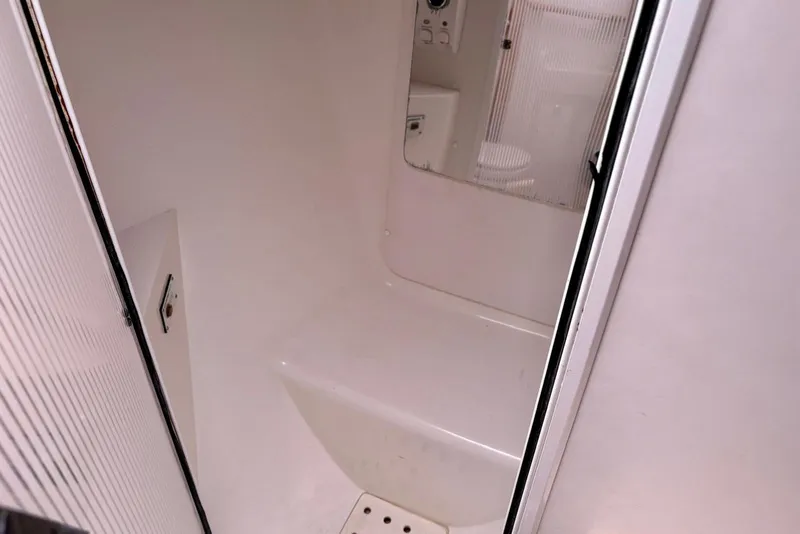 Slide: The Image of Interior of 2000 Catalina 42 MkII sailboat bathroom with shower and toilet. - 16