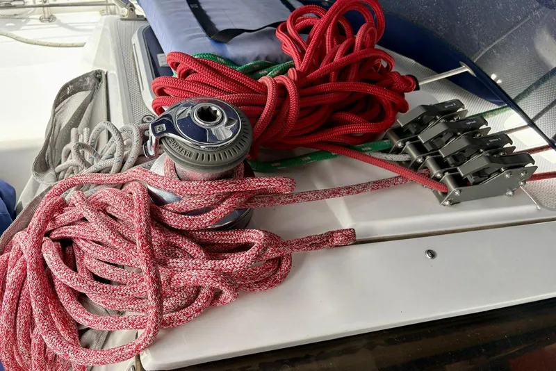Slide: The Image of Deck of 2000 Catalina 42 MkII sailboat with winch and colorful ropes. - 24