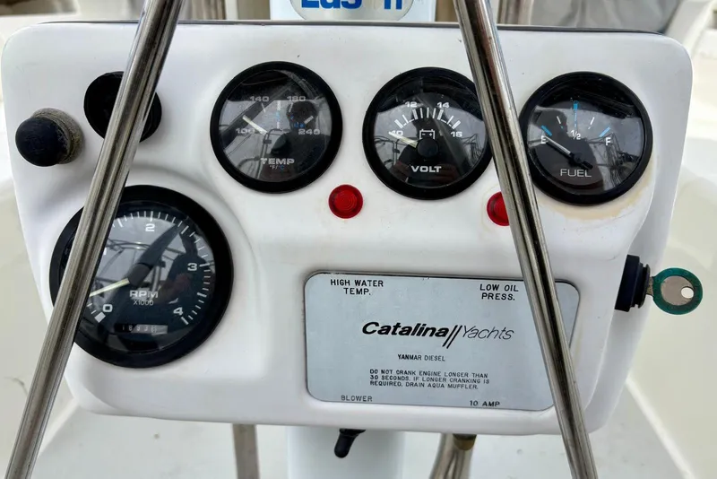 Slide: The Image of Instrument panel of a 2000 Catalina 42 MkII yacht, featuring gauges and controls. - 7