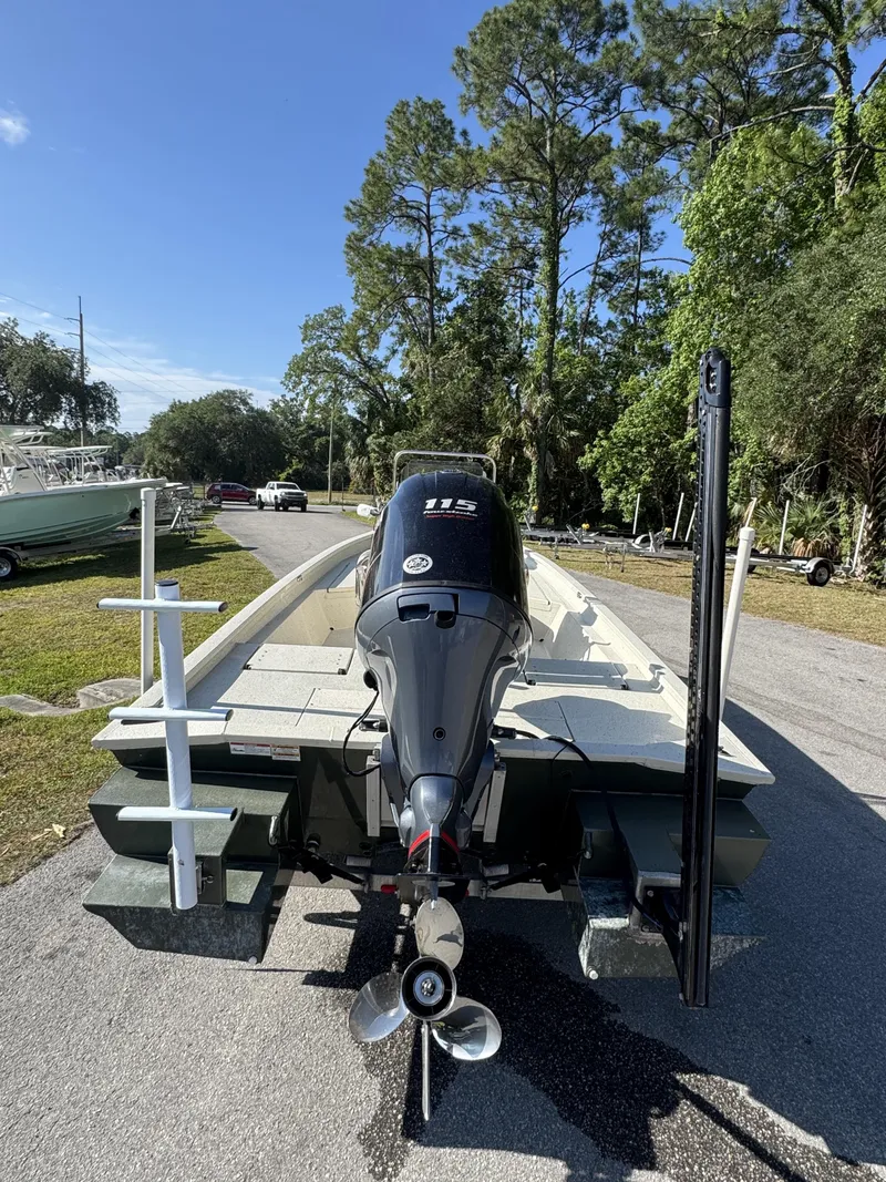 Slide: The Image of 2016 Xpress XP20CC boat with outboard motor on trailer. - 17