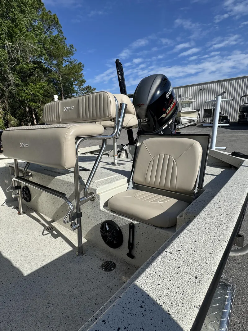 Slide: The Image of 2016 Xpress XP20CC boat with Yamaha outboard motor. - 23