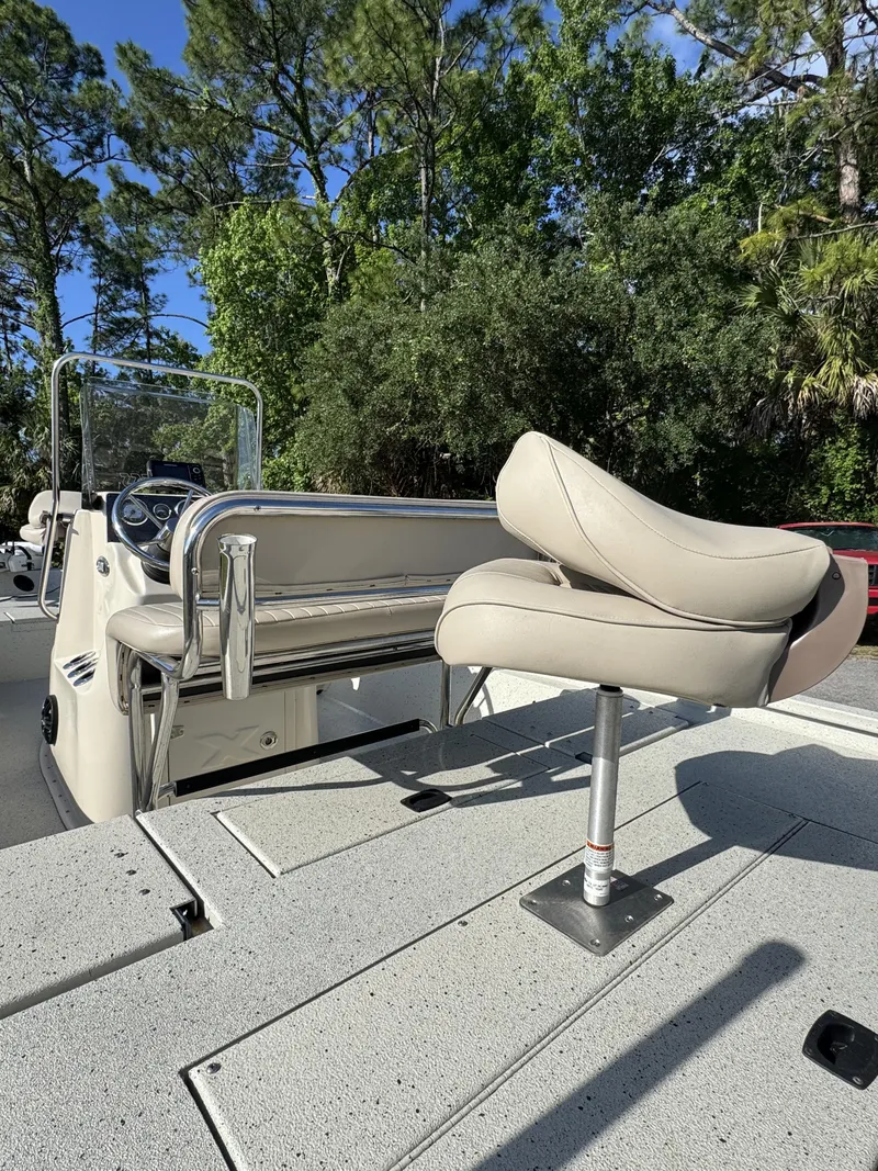 Slide: The Image of 2016 Xpress XP20CC boat with seat and console. - 24