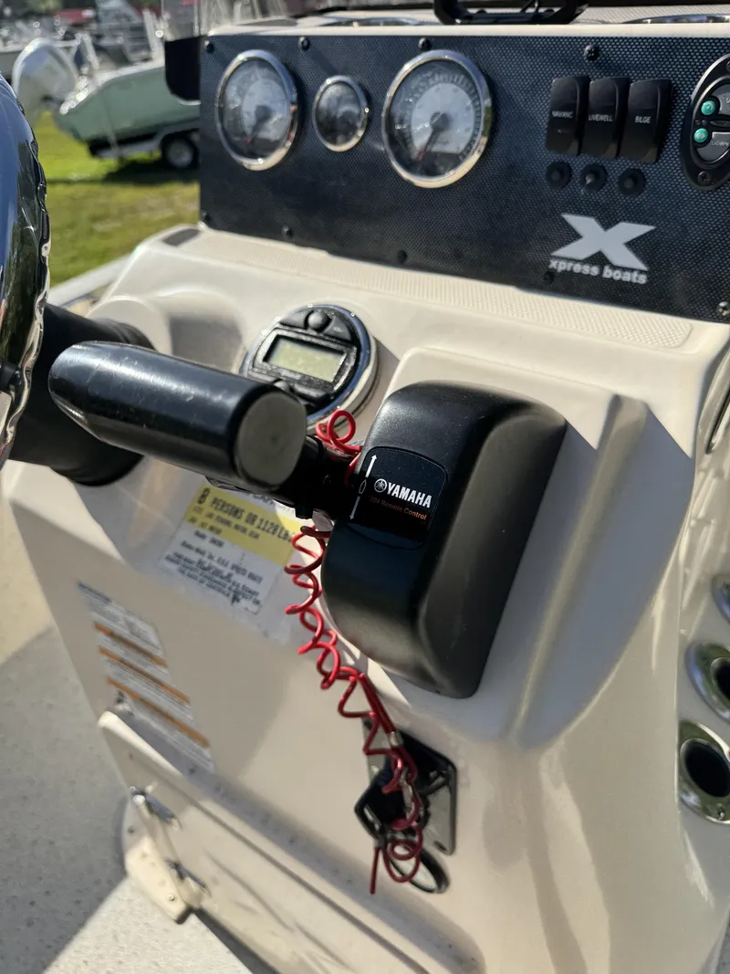 Slide: The Image of Control console of a 2016 Xpress XP20CC boat. - 29