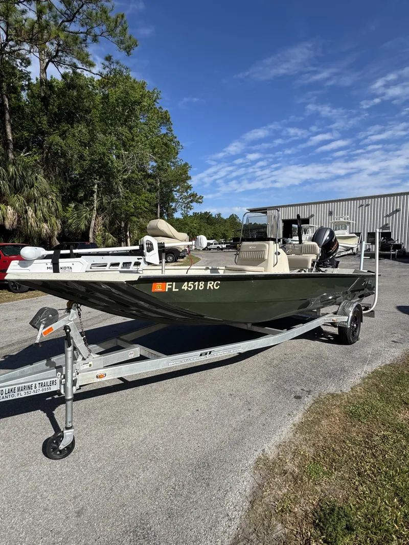 Slide: The Image of 2016 Xpress XP20CC boat on trailer, sunny day. - 4