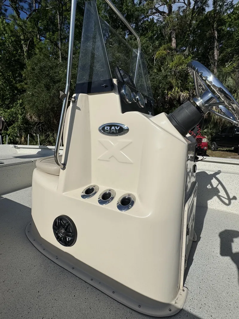 Slide: The Image of 2016 Xpress XP20CC boat console with steering wheel and gauges. - 8