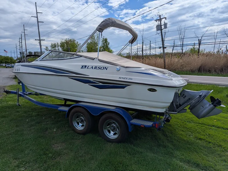Slide: The Image of 2006 Larson Senza 206 boat on trailer, side view. - 5
