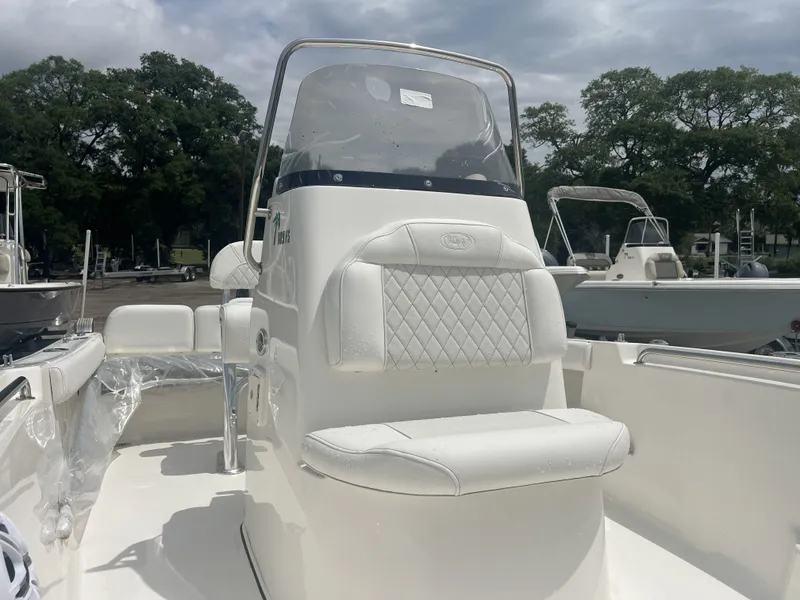 Slide: The Image of 2026 Key West 189 FS boat with white seat and helm console. - 7