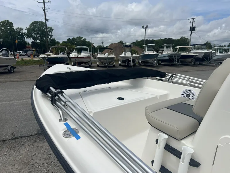 Slide: The Image of Key West 1720 boat 2026 on a lot with other boats. - 6