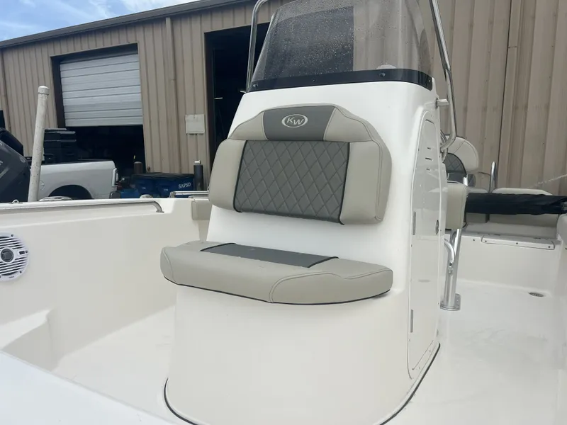 Slide: The Image of Key West 189 FS 2026 boat with cushioned outdoor seating. - 3