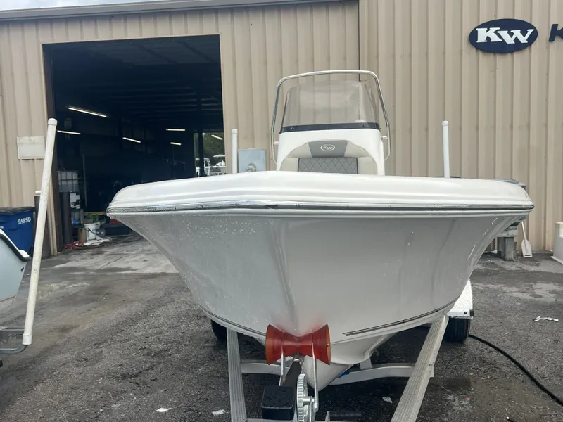 Slide: The Image of Key West 189 FS boat from 2026 in front of a workshop. - 5