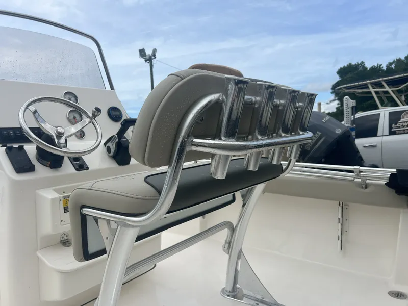 Slide: The Image of Key West 189 FS 2026 boat console with steering and seating. - 8