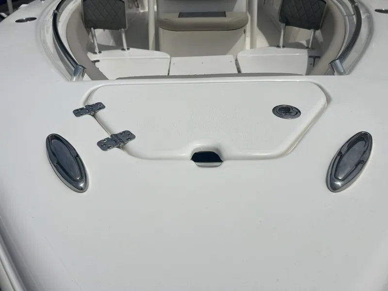 Slide: The Image of Key West 239 FS boat 2026, front deck view with seating area. - 7
