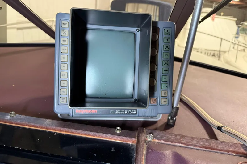 Slide: The Image of Raytheon R20X radar display on 1989 Sea Ray 340 Express Cruiser dashboard. - 20
