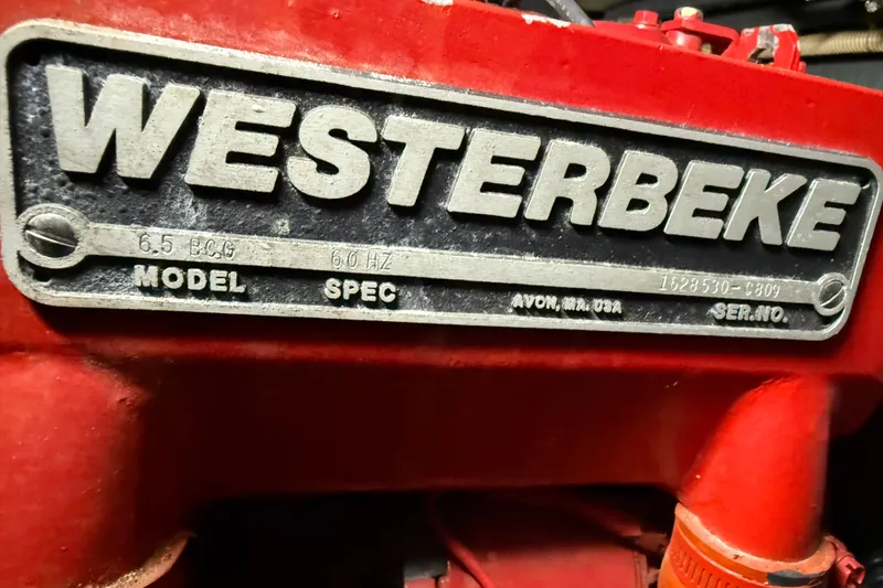 Slide: The Image of Westerbeke engine label on 1989 Sea Ray 340 Express Cruiser, displaying model and specifications. - 24