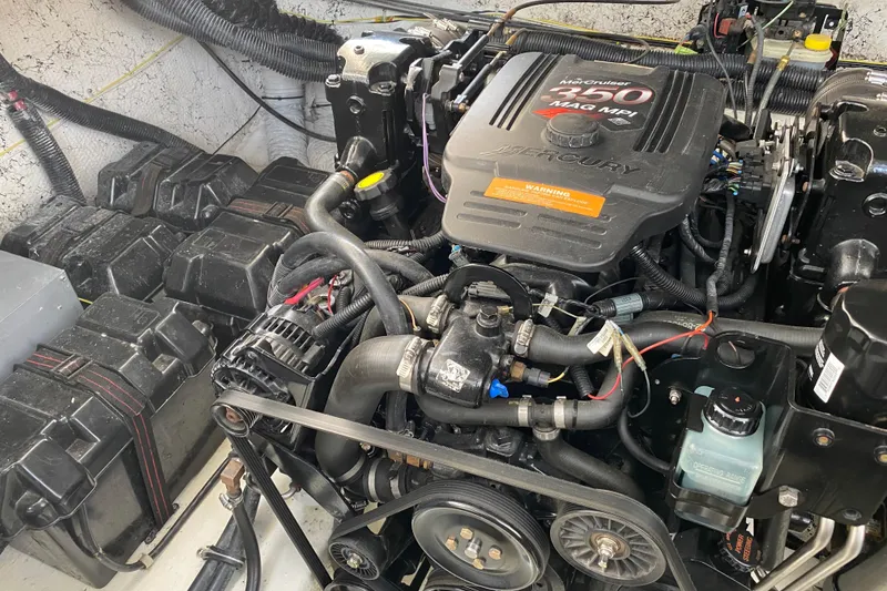 Slide: The Image of Engine compartment of a 2003 Rinker Fiesta Vee 342 with MerCruiser 350 MAG MPI engine. - 14