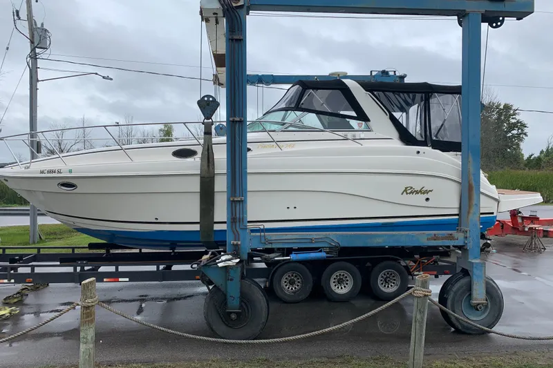Slide: The Image of 2003 Rinker Fiesta Vee 342 boat on trailer, ready for transport. - 2