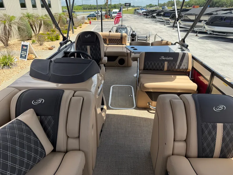 Slide: The Image of Interior of a 2023 Barletta Lusso 25UE pontoon boat with luxurious seating. - 11