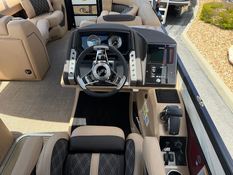 Slide: The Image of Interior of 2023 Barletta Lusso 25UE featuring luxurious cockpit design. - 15