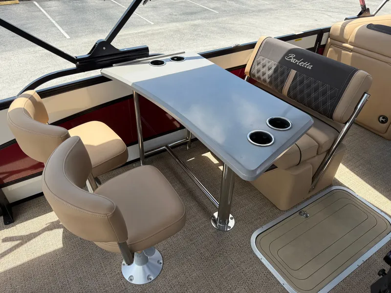 Slide: The Image of Interior of 2023 Barletta Lusso 25UE with table and seating. - 17