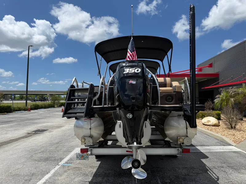 Slide: The Image of 2023 Barletta Lusso 25UE boat with 350 HP engine on trailer. - 7