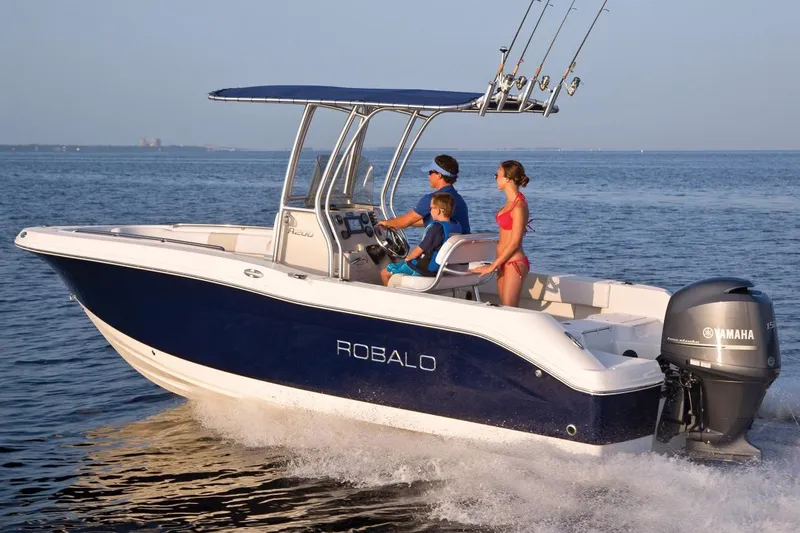 Slide: The Image of Manufacturer Provided Image: 2015 Robalo R200 Center Console boat cruising on the water with passengers. - 16
