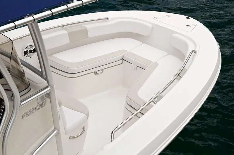 Slide: The Image of Manufacturer Provided Image: 2015 Robalo R200 Center Console boat with cushioned seating area. - 18