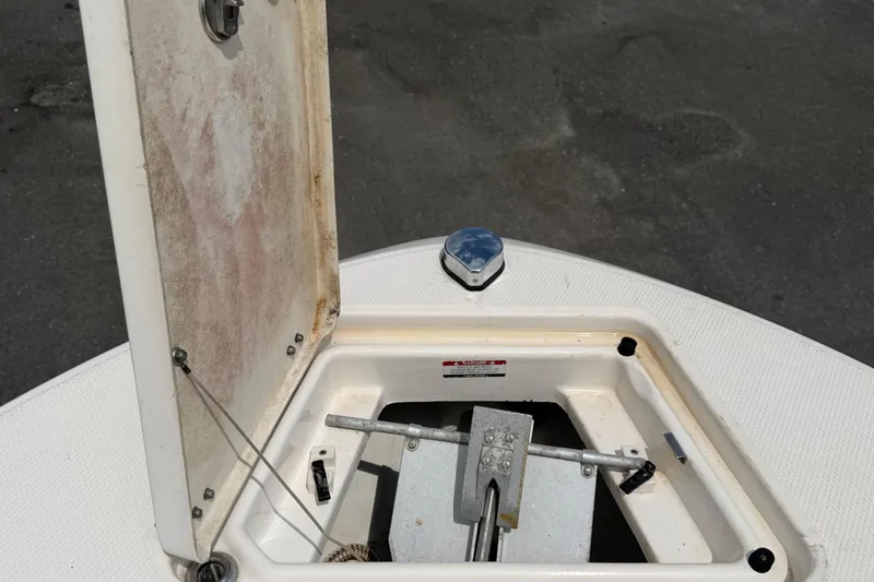 Slide: The Image of Open anchor compartment on 2015 Robalo R200 Center Console boat. - 30