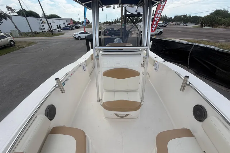 Slide: The Image of 2015 Robalo R200 Center Console boat interior with seating and console view. - 35