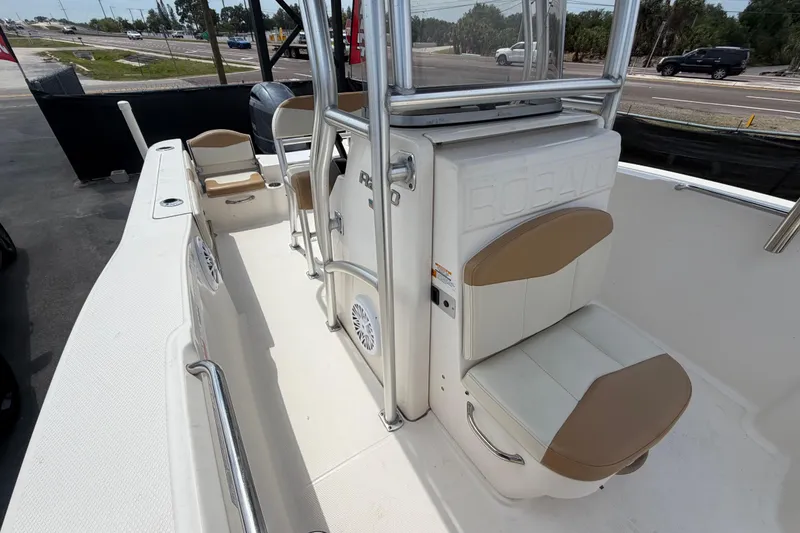 Slide: The Image of 2015 Robalo R200 Center Console boat interior with seating and console view. - 41