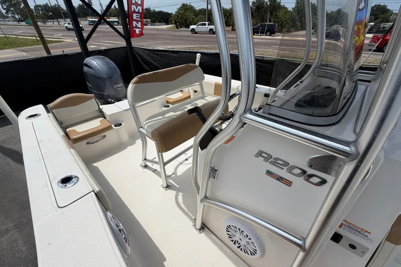 Slide: The Image of 2015 Robalo R200 Center Console boat interior with seating and console details. - 42