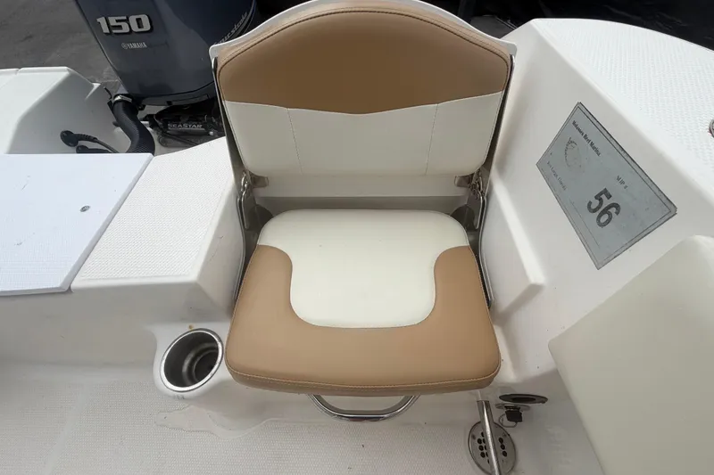 Slide: The Image of 2015 Robalo R200 Center Console boat seat with Yamaha 150 engine in background. - 50