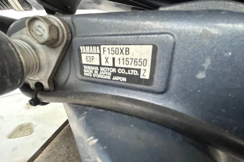 Slide: The Image of Yamaha F150XB engine label on 2015 Robalo R200 Center Console boat. - 56