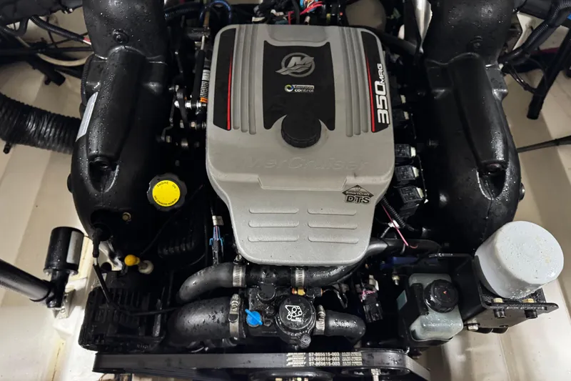 Slide: The Image of Engine of a 2011 Sea Ray SLX 250 boat, featuring a 350 MAG motor. - 11