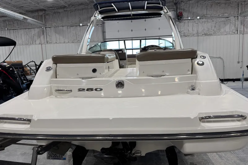 Slide: The Image of 2011 Sea Ray SLX 250 boat in a showroom, rear view. - 5