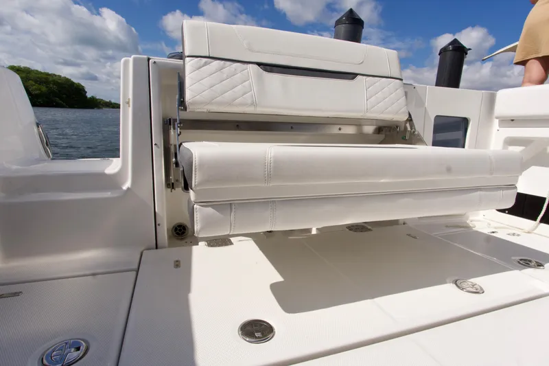 Slide: The Image of 2023 Blackfin 302 CC boat with foldable white seating on deck. - 33