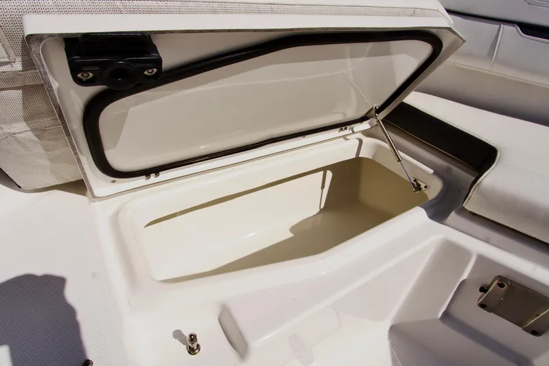 Slide: The Image of Open storage compartment on 2023 Blackfin 302 CC boat, showcasing interior space. - 35