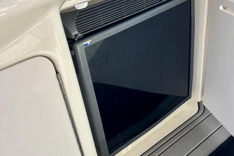 Slide: The Image of Built-in refrigerator on 2006 Sea Ray Sundancer 400 yacht, showcasing sleek design and functionality. - 10