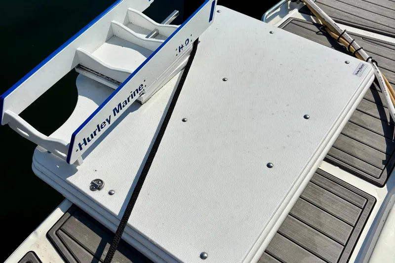 Slide: The Image of Swim platform on 2006 Sea Ray Sundancer 400 with Hurley Marine davit system. - 13