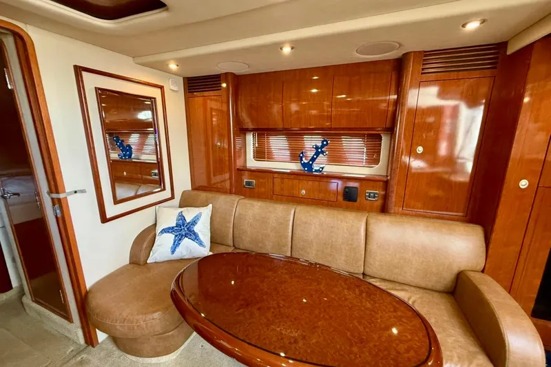 Slide: The Image of Luxurious interior of 2006 Sea Ray Sundancer 400 yacht with elegant wood finishes. - 18