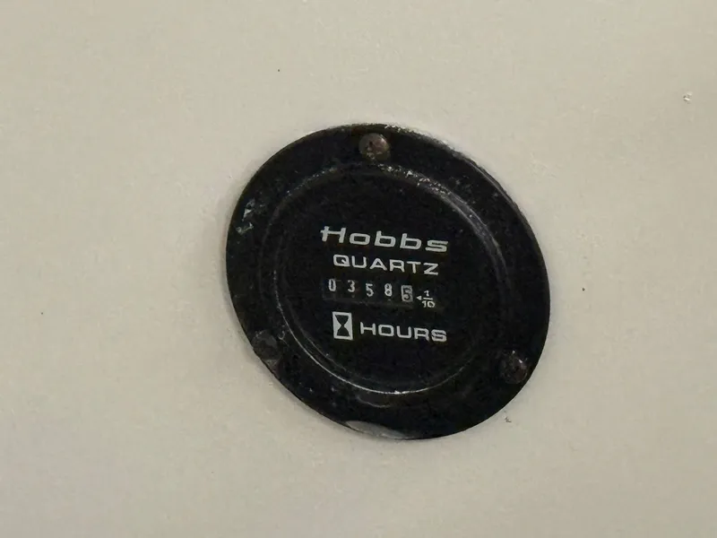 Slide: The Image of Hobbs Quartz hour meter on 2009 Cobalt 230BR boat. - 9
