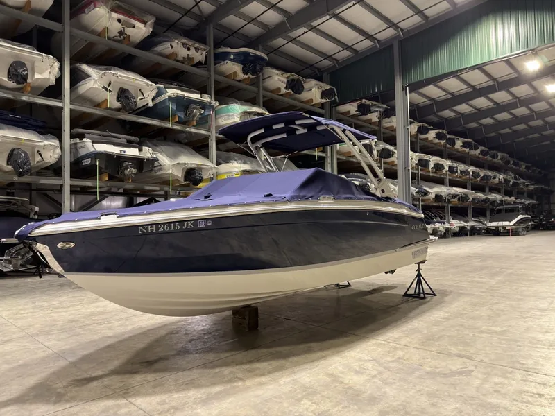 Slide: The Image of 2022 Cobalt R6 boat in storage facility with other boats. - 13
