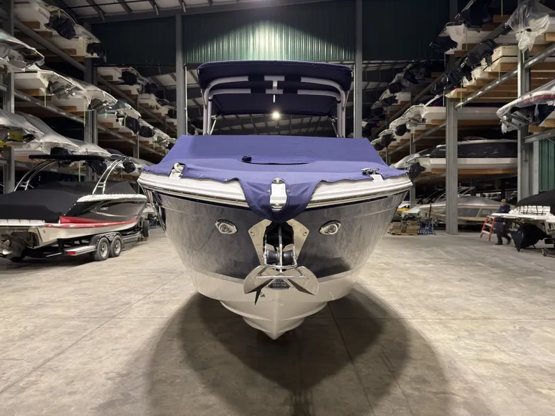Slide: The Image of 2022 Cobalt R6 boat in storage facility, front view. - 14