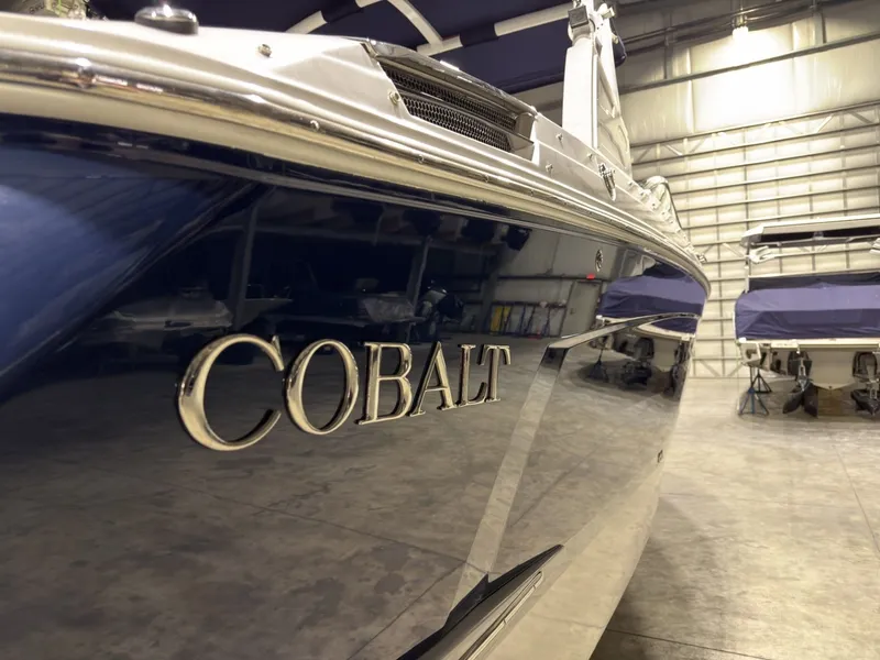 Slide: The Image of 2022 Cobalt R6 boat in a storage facility. - 15